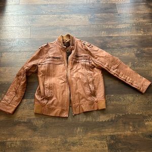 Beautiful leather jacket with some cracking on left shoulder